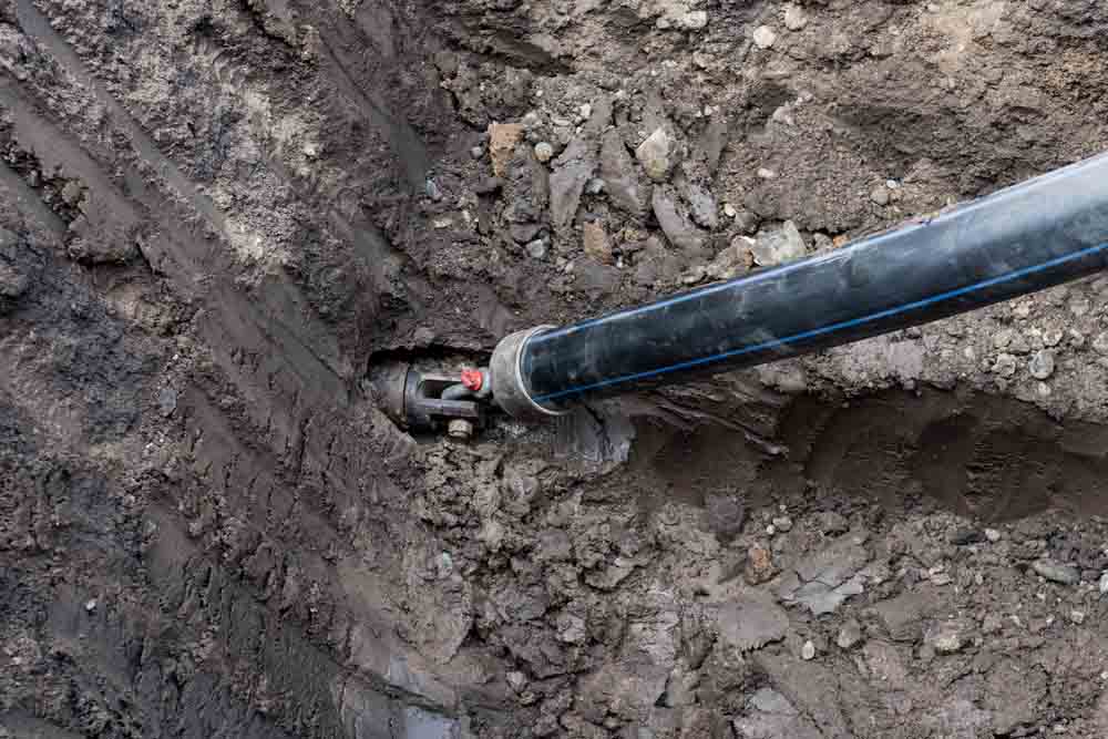 A pipe bursting procedure in progress A pipe bursting procedure in progress